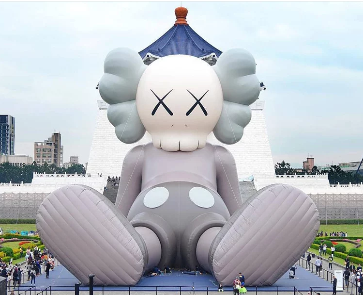 giant KAWS sculpture floating in hong kong harbor will float no longer